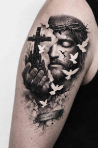 Black and grey tattoo design showing Jesus with a crown of thorns, a cross, and doves; a concept project, suitable for cover-up.